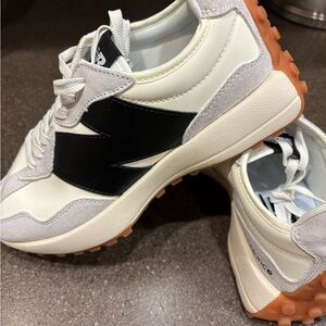 New Balance White and Black Sneakers